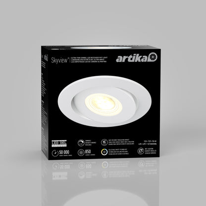 Black and white box packaging for the Artika Skyview 4in Gimbal Round, 5CCT LED light displays a round fixture on the front, with text highlighting adjustable color temperature, 50,000-hour lifespan, and JA8‑2022 compliance.