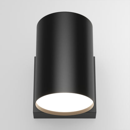 The Walton Indoor/Outdoor LED Wall Light is a black fixture that emits white light.