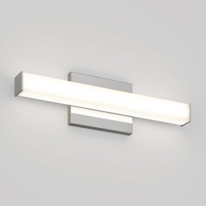 The Mylo LED Vanity Light 16IN features a modern rectangular design with a frosted cover and metallic ends, casting a soft white glow on a plain light gray wall.