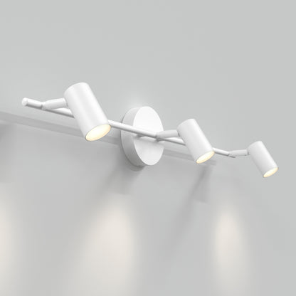 The 32" Rowen 3L tracklight is a modern white wall-mounted fixture featuring three adjustable cylindrical lamps that cast light downward, offering a sleek, minimalist look.