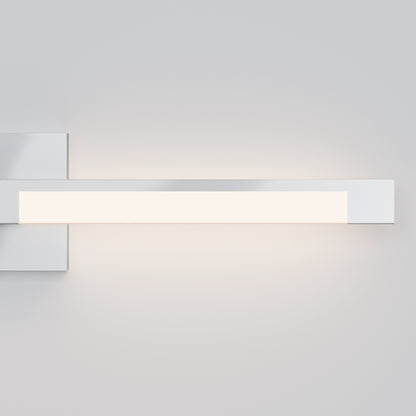The Tivoli 27'' Vanity Light is a modern, minimalist wall fixture with a rectangular design that emits a soft white glow against a plain, light gray background.