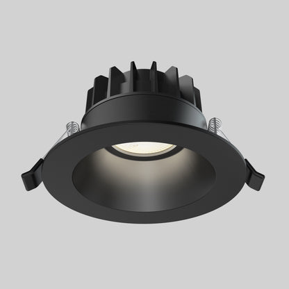 The Skyview 4in Regressed Round, 5CCT LED is a black recessed pot light with adjustable color temperature and round trim, shown from below against a light gray background to showcase its modern, versatile lighting design.