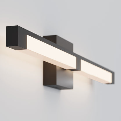 The Tivoli 27'' Vanity Light is a modern rectangular black wall sconce featuring a long horizontal frosted panel that emits a soft, even glow against a plain white wall.