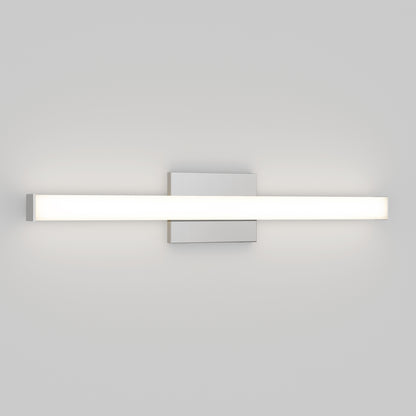 The Mylo LED Vanity Light 24IN is a modern wall-mounted fixture with a horizontal frosted rectangular bar emitting a soft white glow, set on a square metallic base against a plain light gray wall.