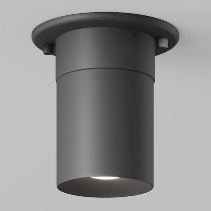 The Beam Pro 4 Integrated LED 2-IN-1 Ceiling Mount Pendant is a modern, black cylindrical fixture with a matte finish, providing soft white downlighting when installed on a plain light gray ceiling.