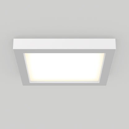 The Skylight Pro Square 7in 3K LED Flush Mount is a modern, minimalist ceiling fixture with a white frame and flat design that emits a bright, even glow on a light gray ceiling.