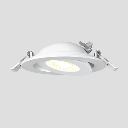 The Skyview 4in Gimbal Round, 5CCT LED is a white, round recessed fixture with adjustable tilt, metal spring clips, selectable colour temperature, and a glowing center, shown against a plain gray background.