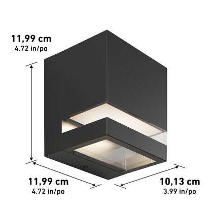 The Valor Square LED Indoor/Outdoor Wall Light is a modern black fixture with an illuminated underside, measuring 11.99 cm (4.72 in) wide and tall, 10.13 cm (3.99 in) deep, and features dimensional labels on each side.