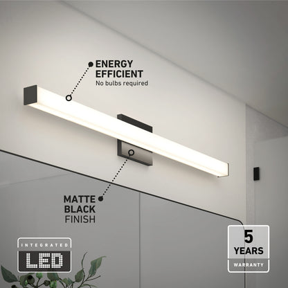 The Mylo LED Vanity Light 36IN, featuring a matte black finish, is mounted above a bathroom mirror. Labels highlight its energy efficiency, integrated LED technology, and 5-year warranty.