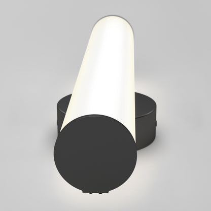 The Kalio Indoor LED Wall Sconce 18" (0-10V, 120-277V) features a modern matte black base and cap with a minimal cylindrical design, emitting a bright, even glow—ideal for contemporary interiors.
