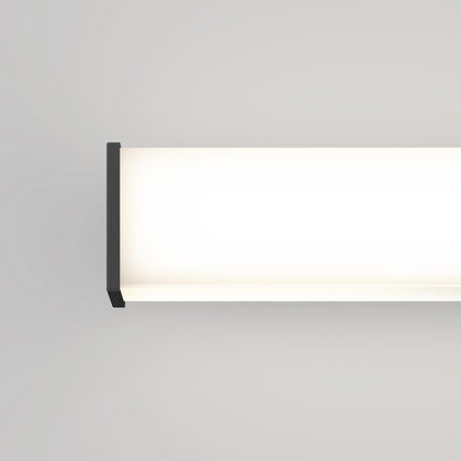 The Mylo LED Vanity Light 24IN features a rectangular, minimalistic design with black edges that casts a bright, even glow on a light gray wall for a modern, contemporary look.