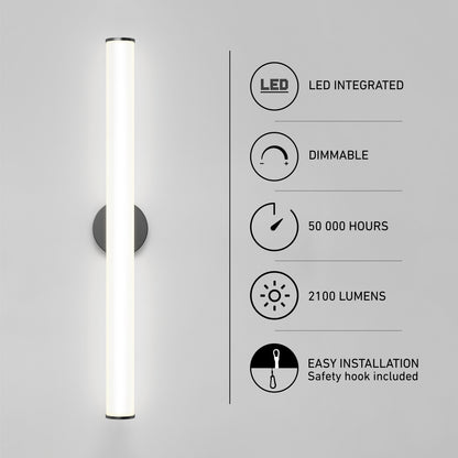 The Kalio Indoor LED Wall Sconce 32" is shown wall-mounted against a gray background. Text highlights: integrated LED, 0-10V dimming, 50,000-hour lifespan, 2100 lumens, easy installation with included safety hook. Compatible with 120-277V.