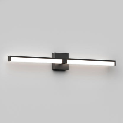The Tivoli 36'' LED Vanity Light is a modern, rectangular wall-mounted fixture with a black frame and glowing white strip, shown on a light gray wall.