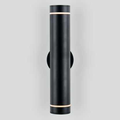 The C7 Pro Outdoor LED Wall Light is a modern, cylindrical black sconce with a matte finish, mounted vertically on a light gray wall. It emits light from slim openings at both the top and bottom of the fixture.