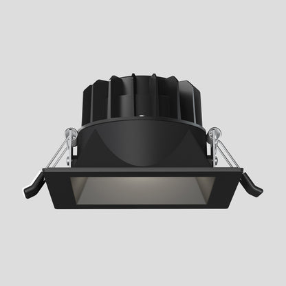 The Skyview 4in Regressed Square, 5CCT LED is a black square recessed pot light with spring clips and a finned heat sink, adjustable color-balance for indoor/outdoor use, designed for ceiling installation and shown on a plain light gray background.