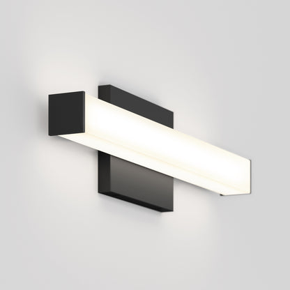 The Mylo LED Vanity Light 16IN is a modern, rectangular wall-mounted fixture with a black base and a horizontal frosted panel that casts a soft glow against a plain white wall.
