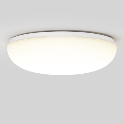 The Knox LED 13In Energy Star Flush Mount is a modern, round white ceiling light with a smooth frosted cover, shown illuminated against a plain light gray ceiling.