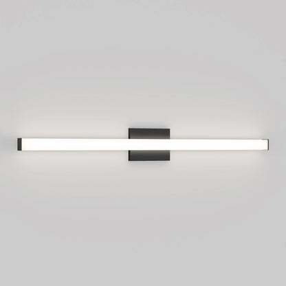 The Mylo LED Vanity Light 36IN features a long horizontal frosted glass tube and a rectangular black base, creating a modern wall-mounted fixture that casts a soft glow on any white wall.