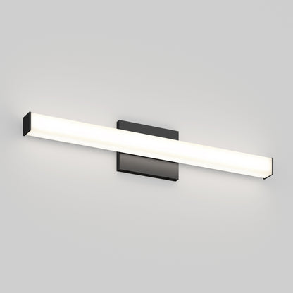 The Mylo LED Vanity Light 24IN is a modern wall-mounted fixture with a long horizontal rectangular design, bright illumination, and a central dark square base set against a plain light-colored wall.