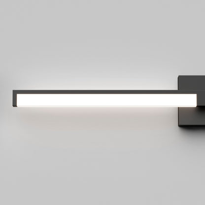 The Tivoli 36'' LED Vanity Light is a modern, rectangular wall-mounted fixture with a black frame, casting bright white light onto a plain light gray wall.