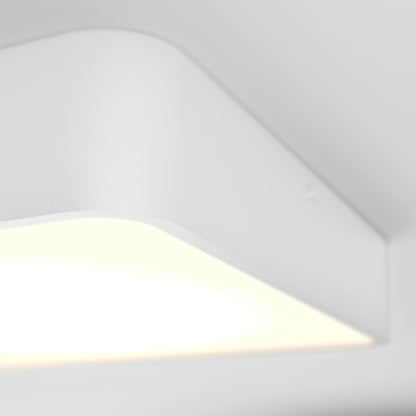 Close-up of the LYDEL LED Ceiling Light, a modern rectangular fixture emitting a soft white glow against a smooth white ceiling background.