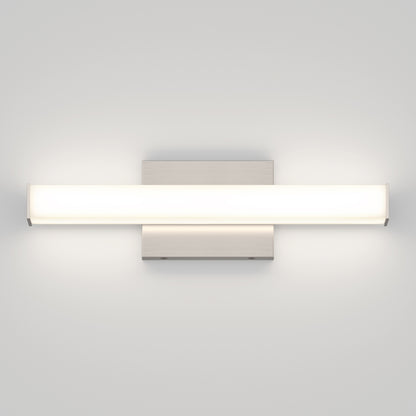 The Mylo LED Vanity Light 16IN features a horizontal frosted glass bar for a soft, even glow, mounted on a sleek rectangular metallic base against a white wall.