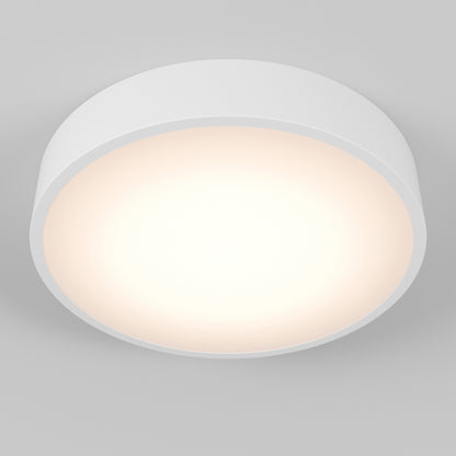 The Concerto LED Flush Mount is a round, flush-mounted ceiling light with a white frame that emits a soft, warm glow against a light gray ceiling.
