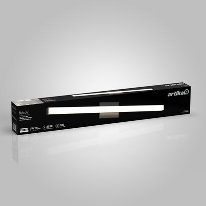 A rectangular black box with “artika” branding contains the Mylo LED Vanity Light 36IN. The box displays an image of the slim, modern light bar, with features and icons on the front. The background is plain gray.