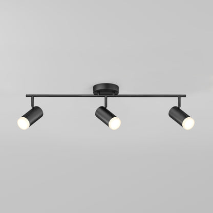 The 32" Blake 3L tracklight features three adjustable black cylindrical LED spotlights on a sleek horizontal bar, delivering soft white task lighting against a plain light gray background.