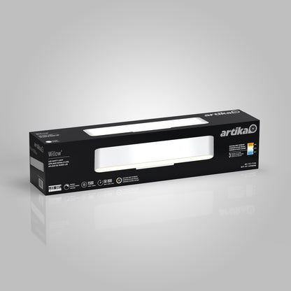 A black rectangular box for the Willow LED Vanity 3CCT Light by Artika, with a front cutout showcasing the fixture and details like adjustable color temperature, brightness, energy efficiency, and lifespan.