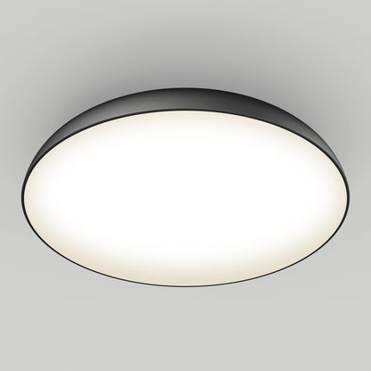 The Flint LED Flush Mount is a modern round ceiling light with a black rim and glowing white center, installed on a plain white ceiling.