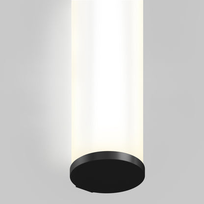 The Kalio Indoor LED Wall Sconce 32" (0-10V, 120-277V) features a glowing white cylindrical body with a black base, installed on a plain light gray ceiling.