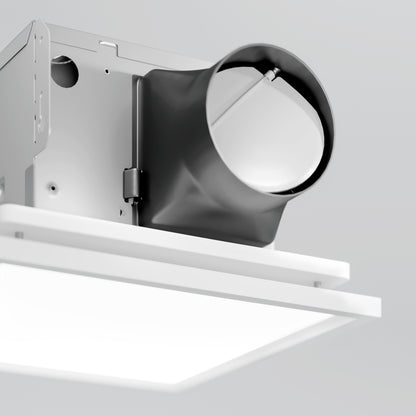 A close-up of the 5 CCT Skylight Breeze Integrated LED Bathroom Fan shows its modern design, featuring a rectangular white panel and black cylindrical component set in a metal housing against a light gray background.