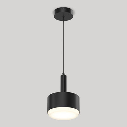 The Fritz Mini LED Pendant features a modern black cylindrical shade suspended by a thin black cord, casting a soft, diffused glow. With dimmable LED technology, it provides customizable lighting. Set against a plain light gray background.