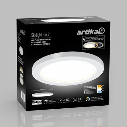 A black retail box for the 7" LED Skylight with 3 colour trim rings, showing the round fixture, trim options, product features, warranty details, and color temperature info in English, French, and Spanish.