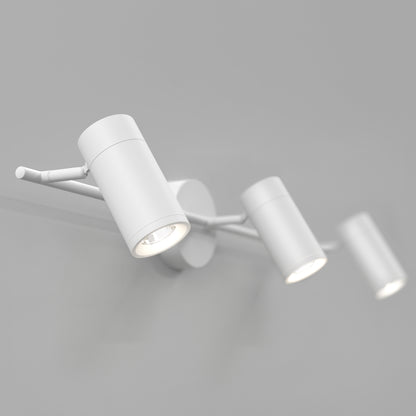 The Alpha LED Track 3-Light, a modern white wall-mounted fixture with three adjustable cylindrical spotlights on a horizontal bar, is illuminated against a plain light gray background.