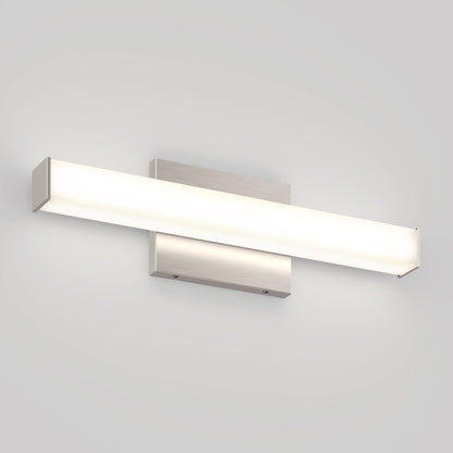 The Mylo LED Vanity Light 16IN features a rectangular brushed metal base and a long horizontal frosted light bar, casting a soft white glow against a light gray wall.