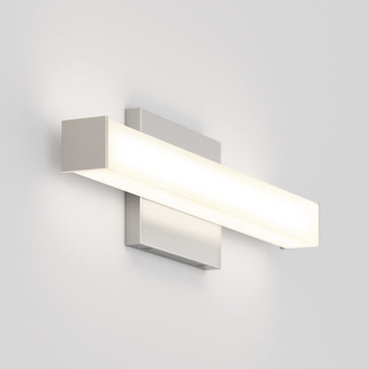 The Mylo LED Vanity Light 16IN is a modern, wall-mounted fixture with a horizontal rectangular shape, brushed metal base, and frosted white illuminated bar, shown installed on a plain white wall.
