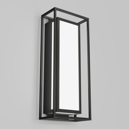 The Ghost Pro Integrated LED Outdoor Wall Light features a modern rectangular design with a black metal frame and a bright white illuminated center panel, shown wall-mounted against a plain light gray background.