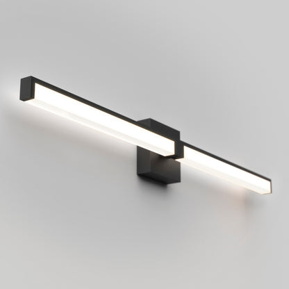 The Tivoli 36'' LED Vanity Light, a modern rectangular fixture with a sleek black frame, emits bright white light and is mounted on a light gray wall.