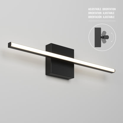 The Delta LED Indoor/Outdoor Wall Light 21" is a modern black wall-mounted fixture with a long horizontal bar, displayed on a plain wall. An inset diagram on the right shows its adjustable orientation feature.