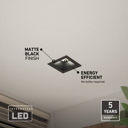 A Skyview 4in Regressed Square, 5CCT LED matte black pot light is installed in a white ceiling. Text highlights energy efficiency, 5-year warranty, adjustable color temperature; icons show integrated indoor/outdoor use and no bulbs required.